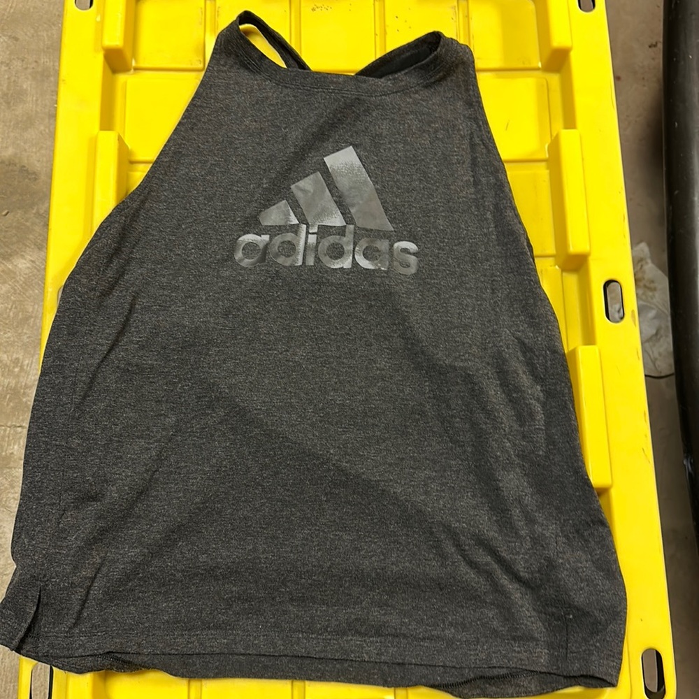 Deep cut Adidas tank